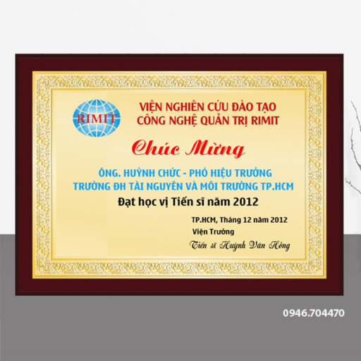 Kỷ niệm chương chúc mừng gỗ đồng